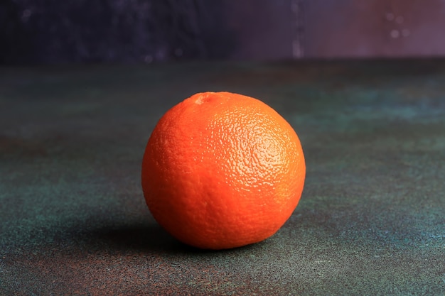 Orange on a rusty grunge background