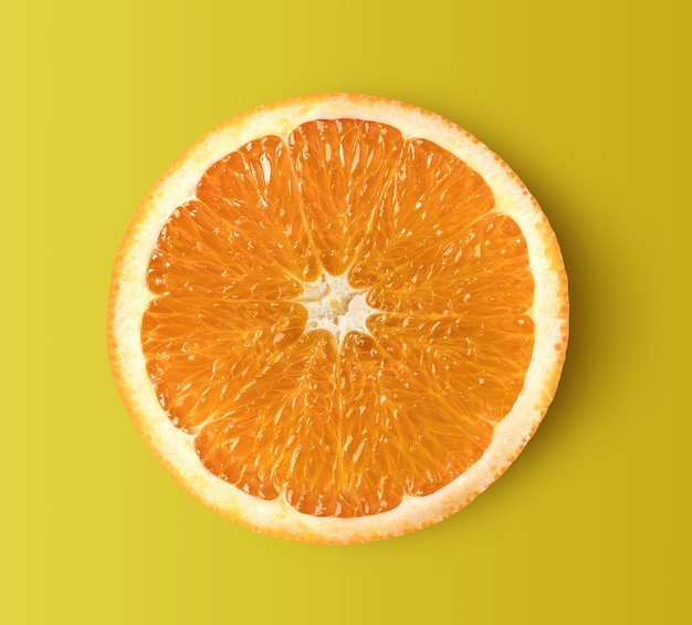 Orange slice isolated on yellow background