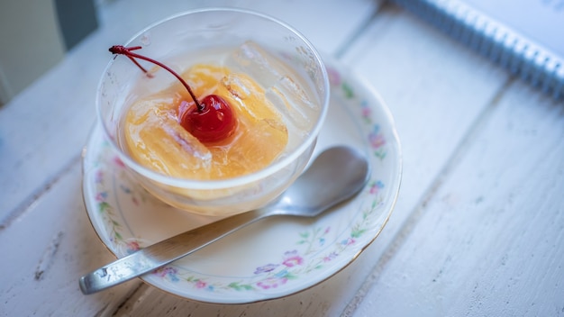 Orange In Sugar Syrup With Cherry Fruit