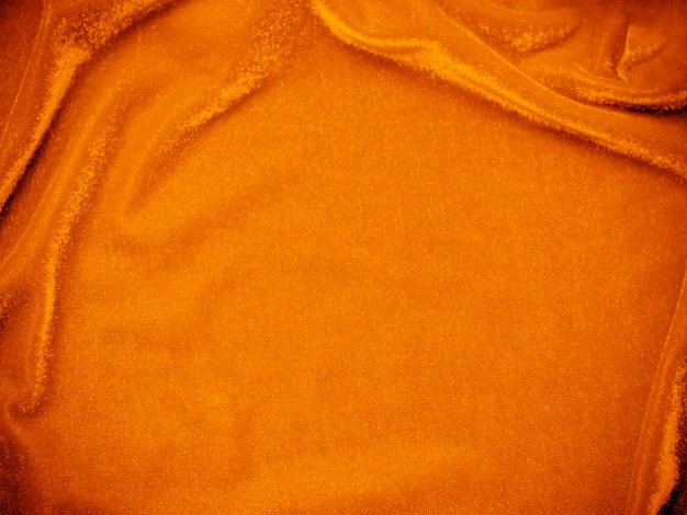 Orange velvet fabric texture used as background Empty Orange fabric background of soft and smooth textile material There is space for textx9