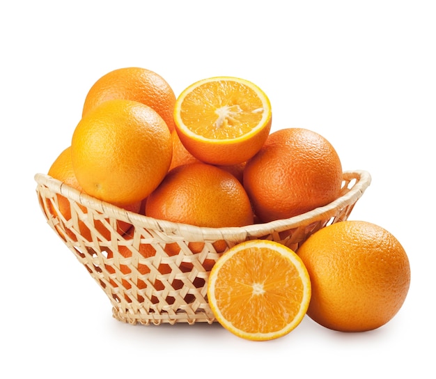 Oranges in a beautiful basket isolated on white