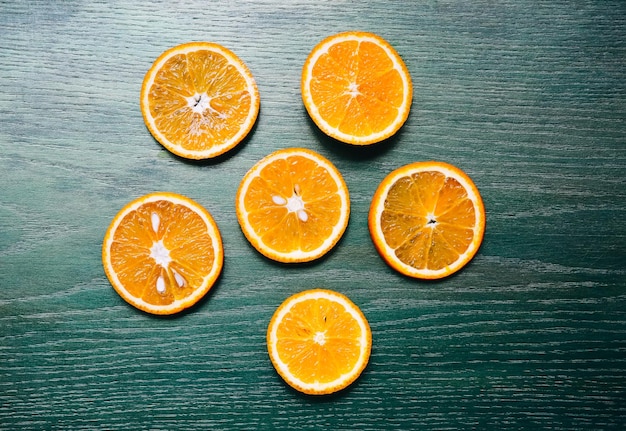 Oranges lying black background Still life photo Healthy style Fruit and nature