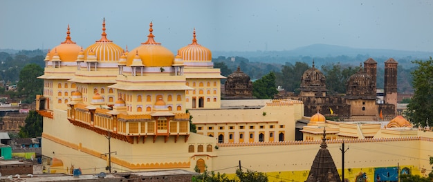 Orchha cityscape, kitsch yellow Ram Raja temple. Also spelled Orcha, famous travel destination in Madhya Pradesh, India.