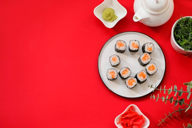 Order delivery japanese food sushi rolls while