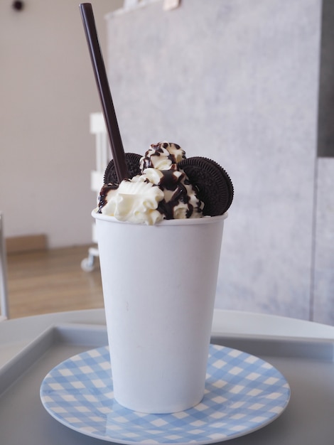 Oreo Smoothie with coffee shop background