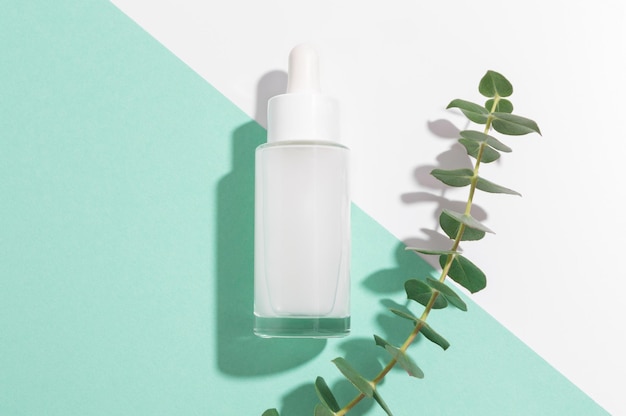 Organic facial serum and eucalyptus leaves