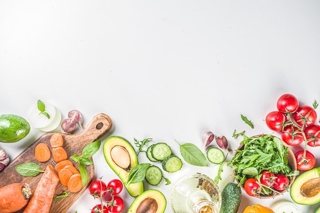 Organic fresh raw vegetables flatlay. Healthy food cooking background with various vegetable salad ingredients.