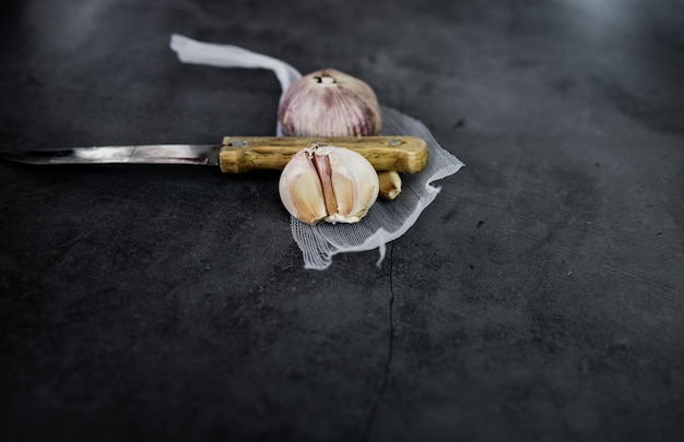 Organic garlic and knife