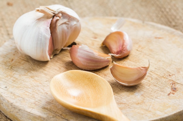 organic garlic on wooden table close up.