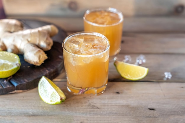 Organic Ginger Ale Soda in a Glass with Lemon and Lime High quality photo