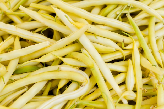 Organic green beans in a pile at the local farmer's  market.