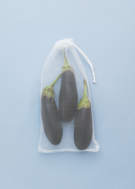 Organic Ripe Eggplant in Shopping Net Bag Top View