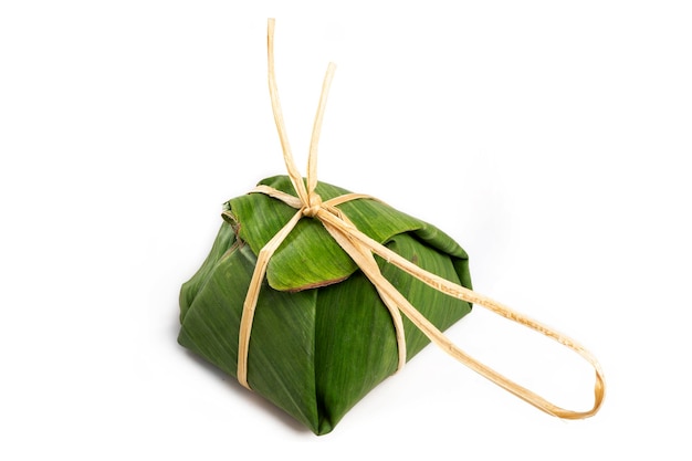 Organic Sticky Rice wrapped in banana leaf with natural string traditional Thai style packaging