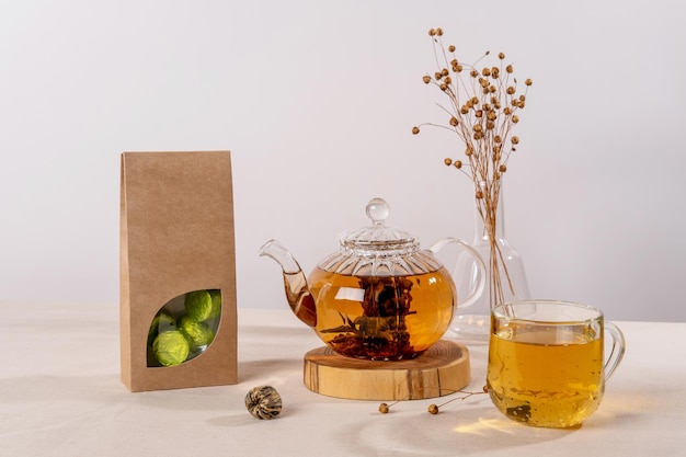 Organic tea branding and packaging mockup Blank tea packaging mockup with tea Kraft paper pack with window and empty space to display your branding design