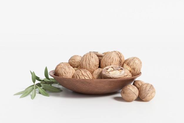 Organic walnuts in 3d rendering on white backgound