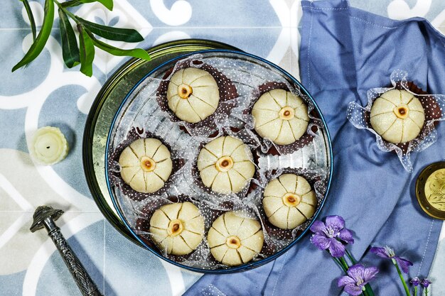 Oriental Algerian sweet cookies named Touma in Arabic language mean garlic in english in old metal b