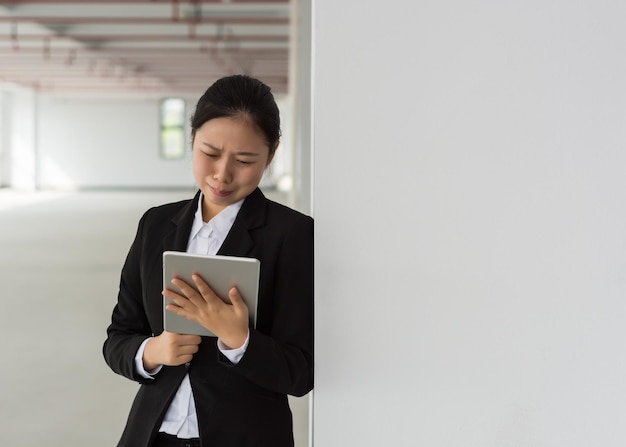 Oriental fashion woman using IPAD