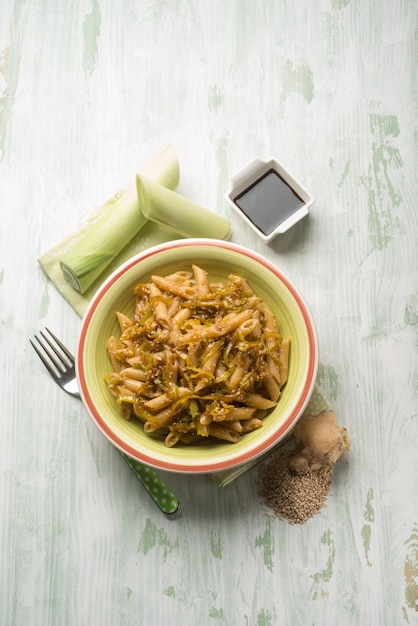 Oriental pasta with leek seed sesame ginger and soya sauce