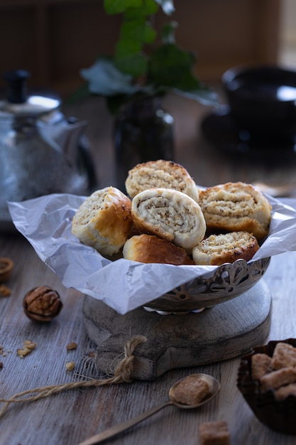 Oriental pastry made from puff pastry and wrapped in it a filling of sugar, butter and walnut