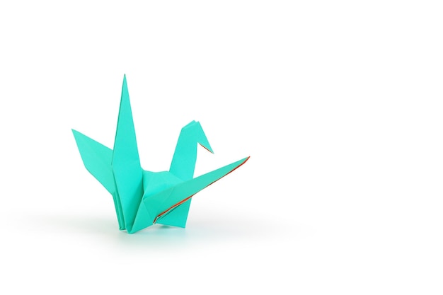 Origami crane isolated over white studio background Image with Clipping path and copy space