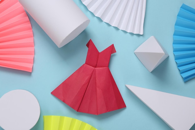 Origami dress on abstract background with geometric shapes Minimalism Concept art Creative layout