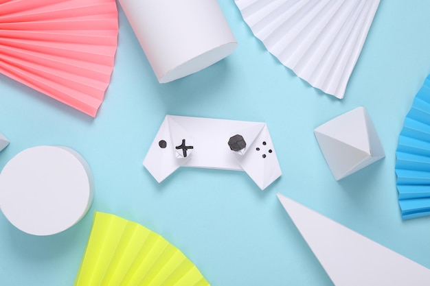 Origami gamepad on abstract background with geometric shapes Minimalism Concept art Creative layout