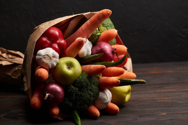 The original unusual edible bouquet of vegetables on a dark wood