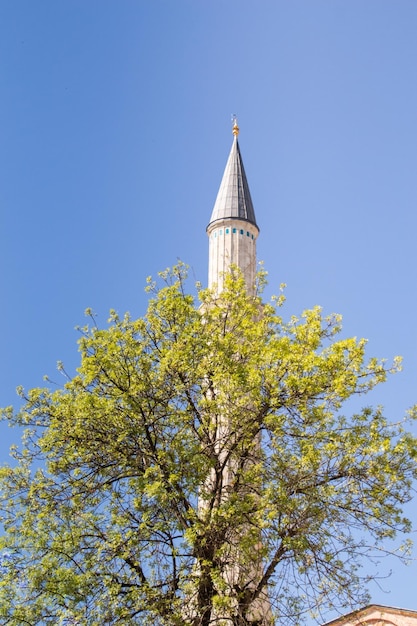 Ottoman Turkish style mosque minaret as Religious Muslim temple architecture