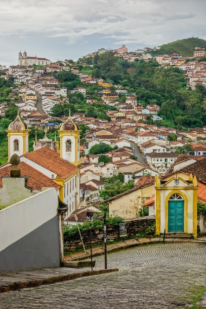 Ouro preto mg brazil street slope and ancient buildings of colonial city