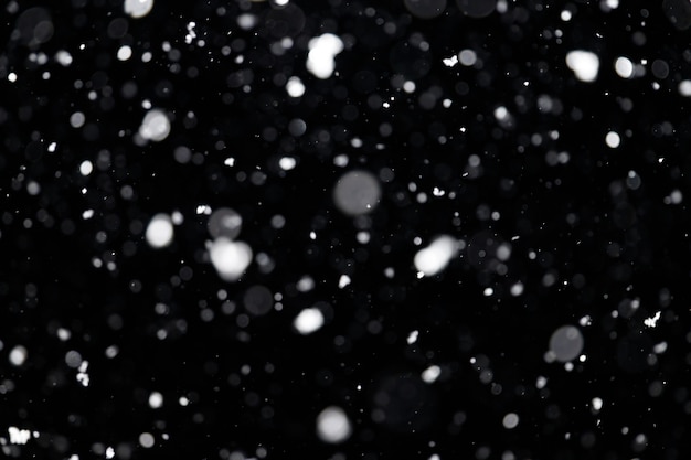 Out of focus snowfall for use as a texture layer in your project Design element for overlay