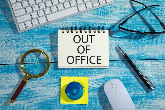 Out Of Office on notepad Business concept