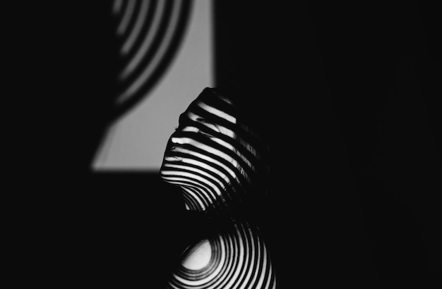 Out of this world Monochrome studio shot of a woman with patterns projected onto her