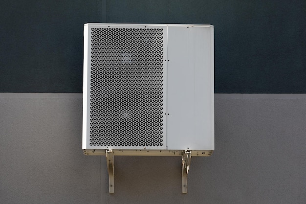 Outdoor air conditioner unit on the wall of a building