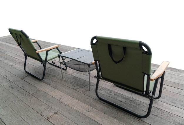 Outdoor camping seats and camping chairs and tables on isolated white