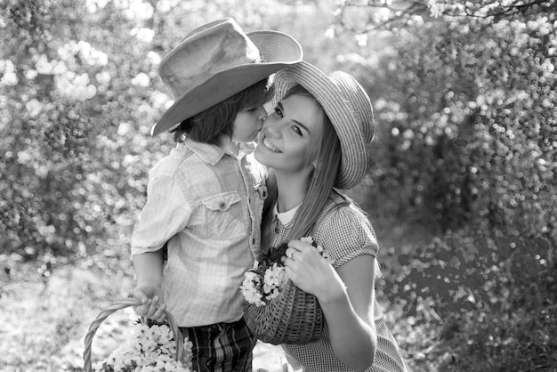 Outdoor family leisure mother and child at spring picnic happy summer at park