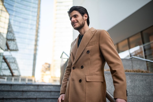 Outdoor fashion portrait of a young man