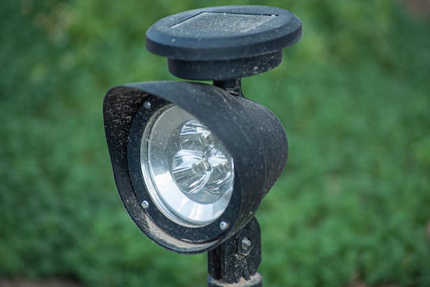 Outdoor lamp on yard lawn for garden lighting in summer park