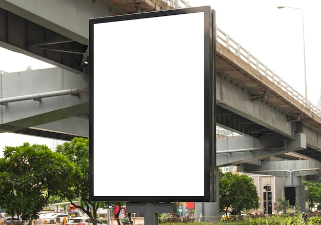 Outdoor pole billboard with mock up white screen on footpath and clipping path