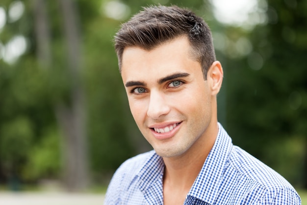 Outdoor portrait of an handsome young man