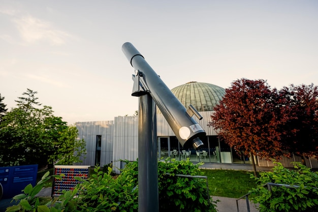 Outdoor steel telescope at observatory in park