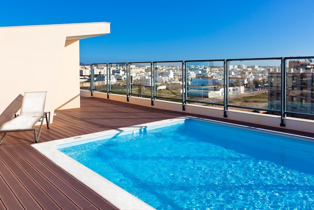 Outdoor swimming pool at the House roof