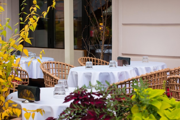 Outdoor tables in the restaurant Cafe summer veranda