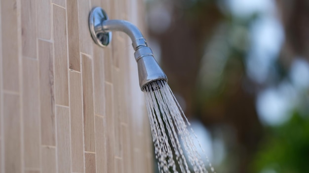 Outdoor tropical beach shower by pool or sea