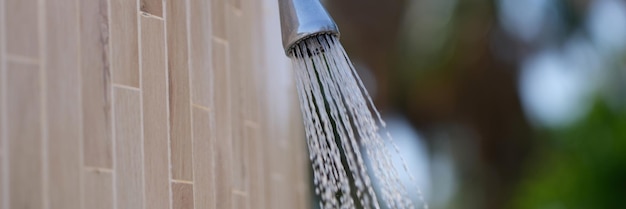 Outdoor tropical beach shower by pool or sea