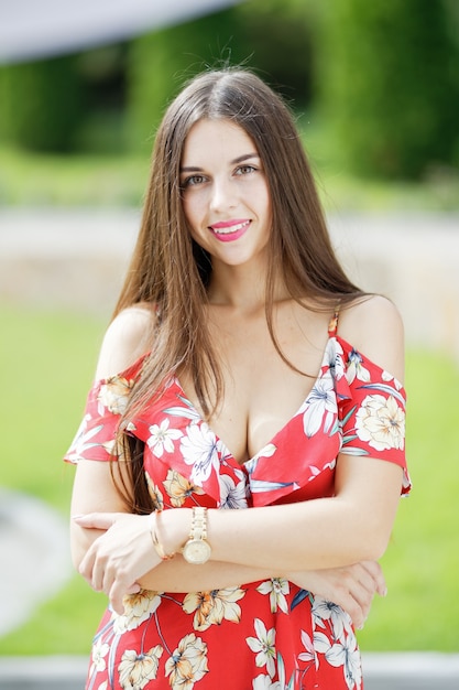 Outdoors portrait of beautiful brunette woman