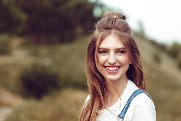 Outdoors portrait of beautiful young girl