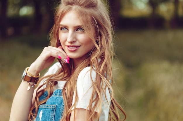 Outdoors portrait of beautiful young girl