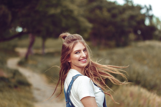 Outdoors portrait of beautiful young girl