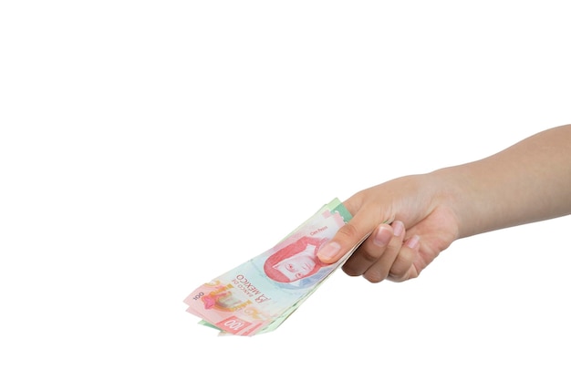 Outstretched arm holding banknotes in hand making the gesture of paying with white background and copy space