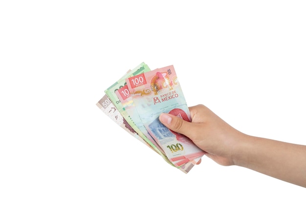 Outstretched hand holding banknotes making the gesture of paying with white background and copy space